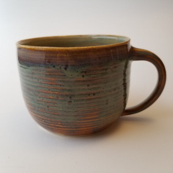 Speckle blue mug front, little j studio, handmade portland pottery